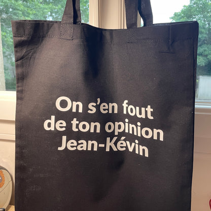 Tote bag en coton noir "On s'en fout de ton opinion Jean-Kévin"