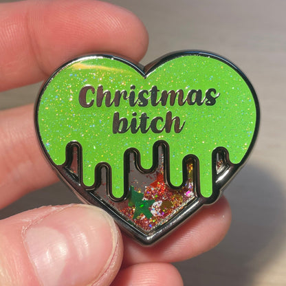 [CONTRÔLE TECHNIQUE] Pin en émail "Christmas bitch" vert à paillettes et paillettes liquides