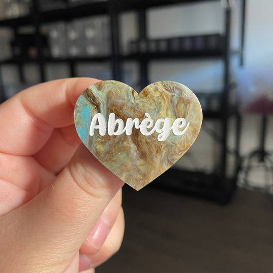 Broche "Abrège" en acrylique marbrée bleue et marron à paillettes