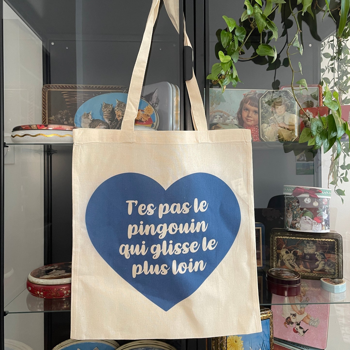 Tote bag en coton "T'es pas le pingouin qui glisse le plus loin"