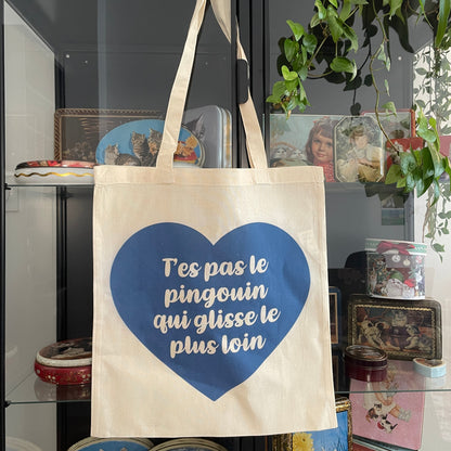 Tote bag en coton "T'es pas le pingouin qui glisse le plus loin"