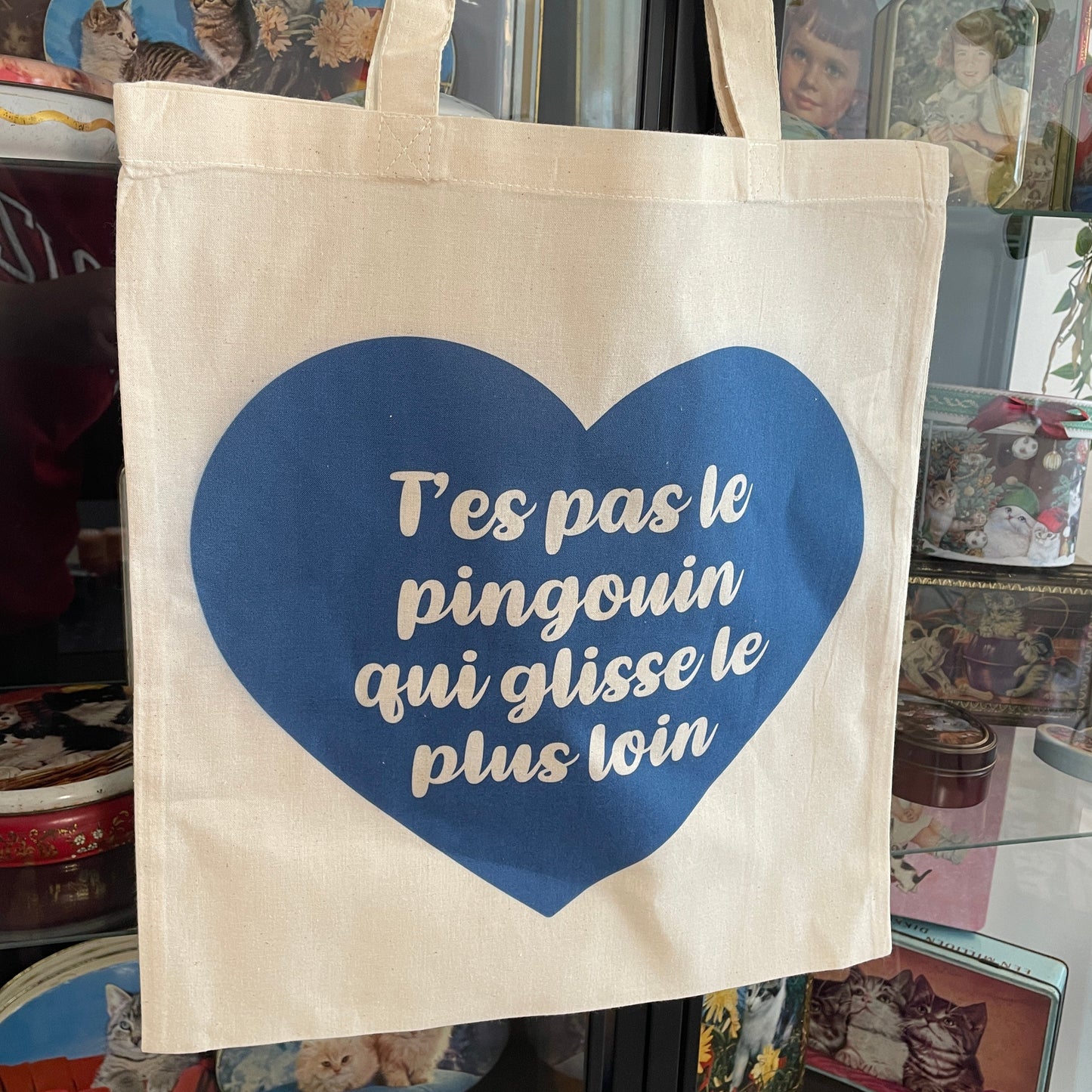 Tote bag en coton "T'es pas le pingouin qui glisse le plus loin"