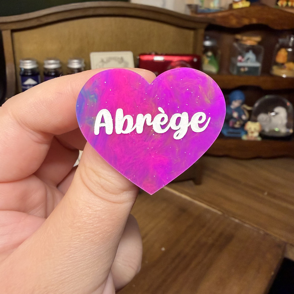 Broche "Abrège" en acrylique semi transparente marbrée multicolore