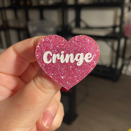 Broche "Cringe" en acrylique à paillettes roses
