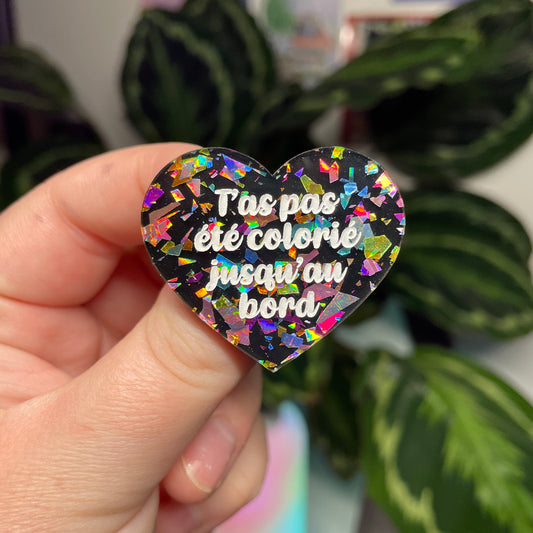 [Contrôle technique] Broche "T'as pas été colorié jusqu'au bord" en acrylique noire avec des éclats de confettis multicolores