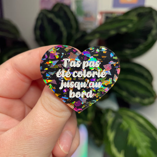 [Contrôle technique] Broche "T'as pas été colorié jusqu'au bord" en acrylique noire avec des éclats de confettis multicolores
