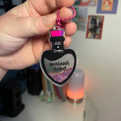 Porte-clés shaker rose "Anxious bitch elixir"
