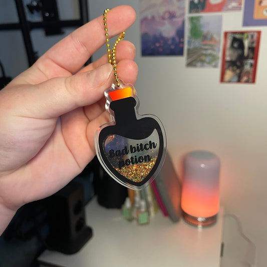 Porte-clés shaker doré "Bad bitch potion"