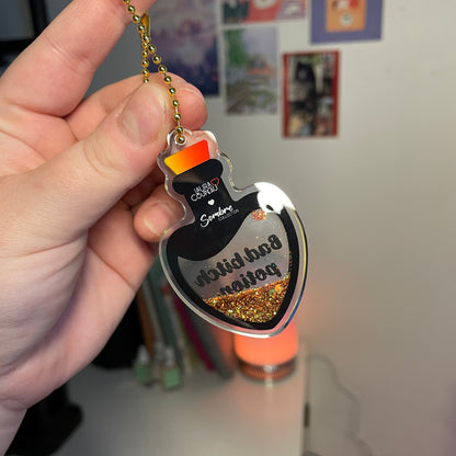 Porte-clés shaker doré "Bad bitch potion"