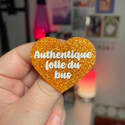 Broche "Authentique folle du bus" en acrylique à paillettes oranges