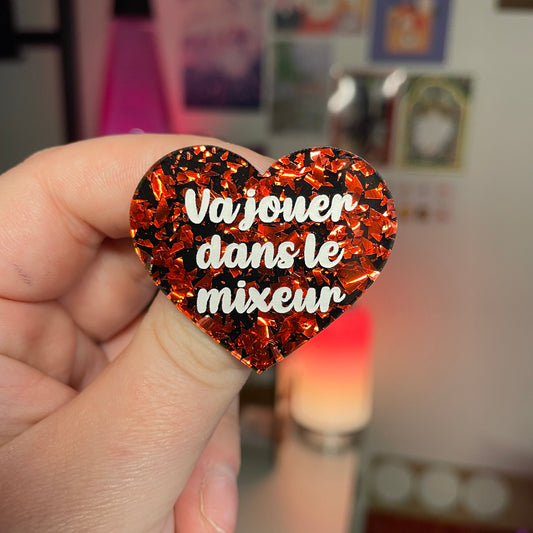[Contrôle technique] Broche "Va jouer dans le mixeur" en acrylique noire avec des éclats de confettis rouges