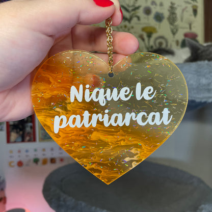 Mini murale "Nique le patriarcat" en acrylique japonaise semi transparente marbrée orange