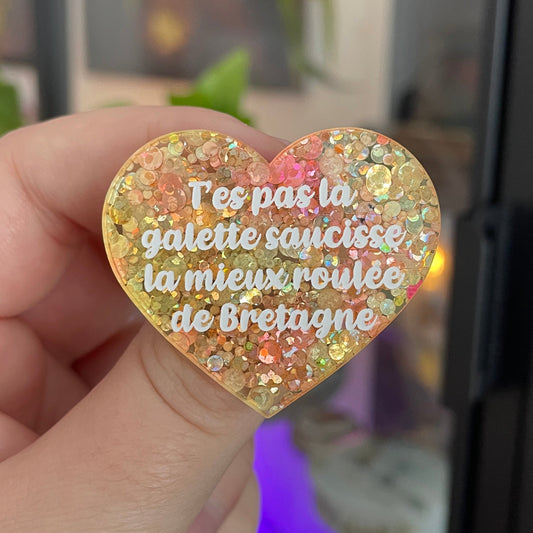 [CONTRÔLE TECHNIQUE] Broche "T'es pas la galette saucisse la mieux roulée de Bretagne" en acrylique semi-transparente à pois oranges