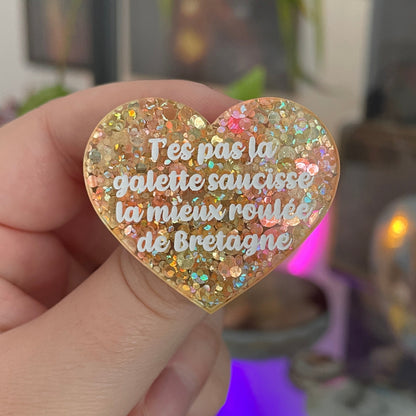 [CONTRÔLE TECHNIQUE] Broche "T'es pas la galette saucisse la mieux roulée de Bretagne" en acrylique semi-transparente à pois oranges