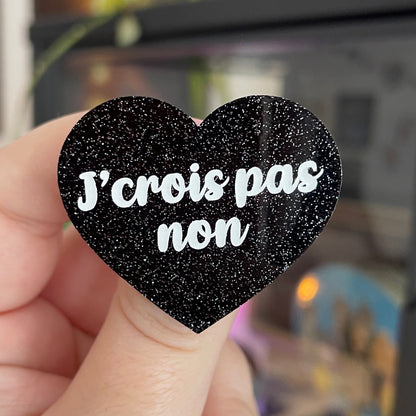 Broche "J'crois pas non" en acrylique noire à paillettes