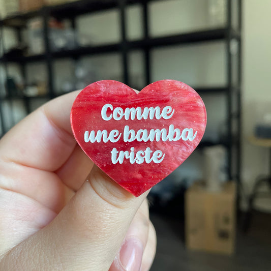 Broche "Comme une bamba triste" en acrylique marbrée rose à paillettes