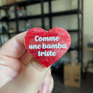 Broche "Comme une bamba triste" en acrylique marbrée rose à paillettes