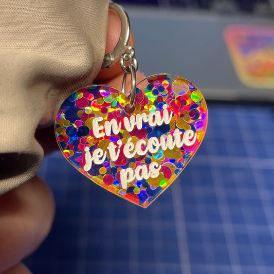 [A l'unité] Petites boucle d'oreille coeur pendante "Non" en acrylique transparente avec des pois jaunes, roses et bleus
