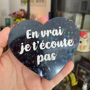 Mini murale "En vrai je t'écoute pas" en acrylique noire holographique et vinyl blanc