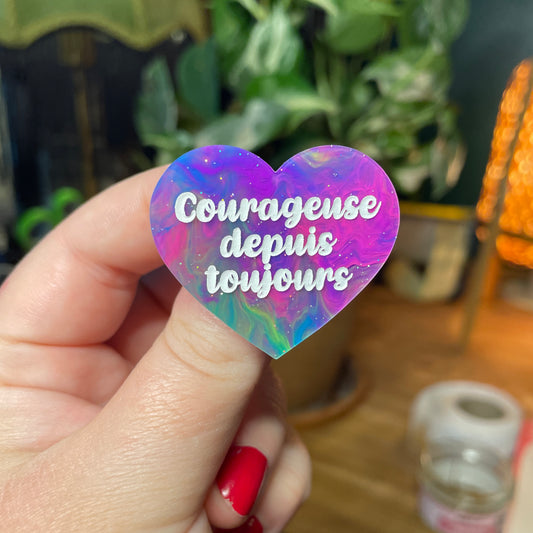 Broche "Courageuse depuis toujours" en acrylique semi transparente marbrée multicolore