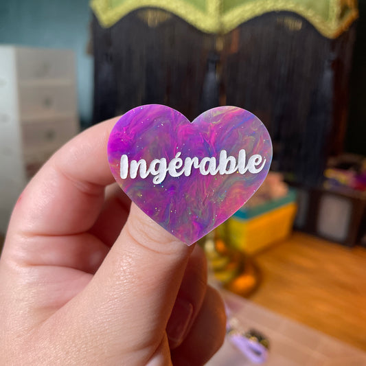 [Contrôle technique] Broche "Ingérable" en acrylique semi transparente marbrée multicolore