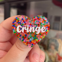 Charger l&#39;image dans la galerie, Broche &quot;Cringe&quot; en acrylique semi-transparente avec des confettis étoiles multicolores