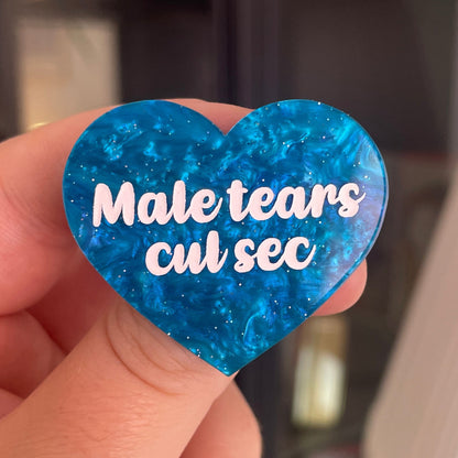 [CONTRÔLE TECHNIQUE] Broche "Male tears cul sec" en acrylique marbrée bleue à paillettes
