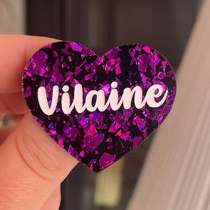 [CONTRÔLE TECHNIQUE] Broche "Vilaine" en acrylique noire avec des éclats de confettis violets