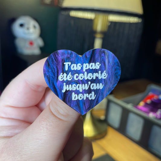 Broche "T'as pas été colorié jusqu'au bord" en acrylique marbrée bleue, noire et violette