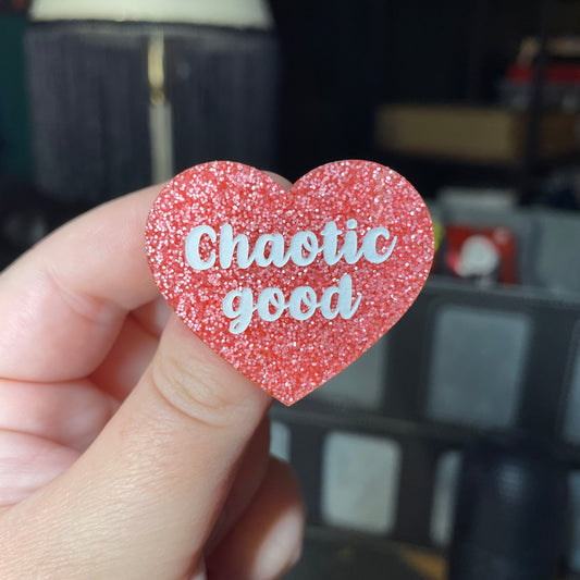 Broche "Chaotic good" en acrylique à paillettes roses