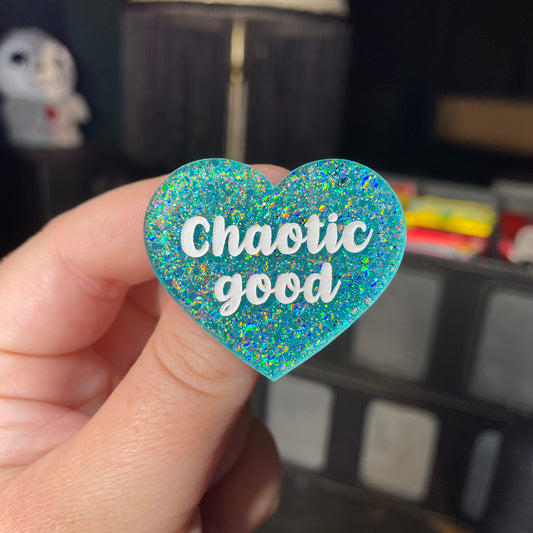 Broche "Chaotic good" en acrylique à paillettes turquoise