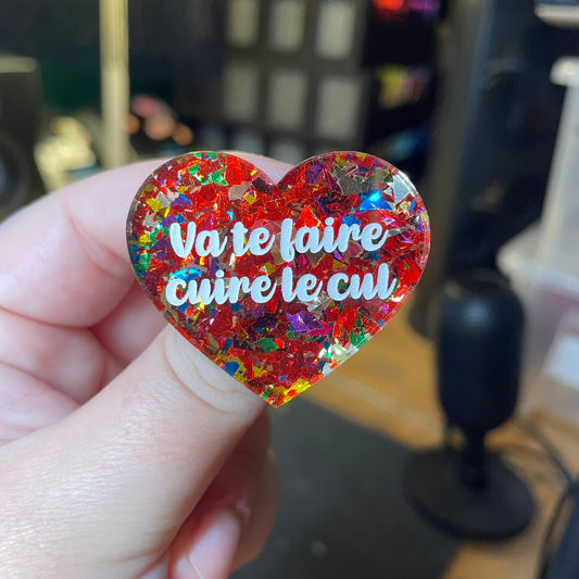 [Contrôle technique] Broche "Va te faire cuire le cul" en acrylique transparente avec des confettis rouges et multicolores