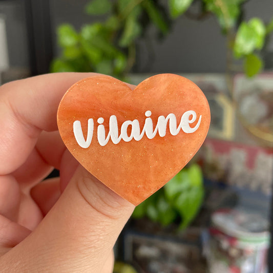 [CONTRÔLE TECHNIQUE] Broche "Vilaine" en acrylique marbrée orange à paillettes