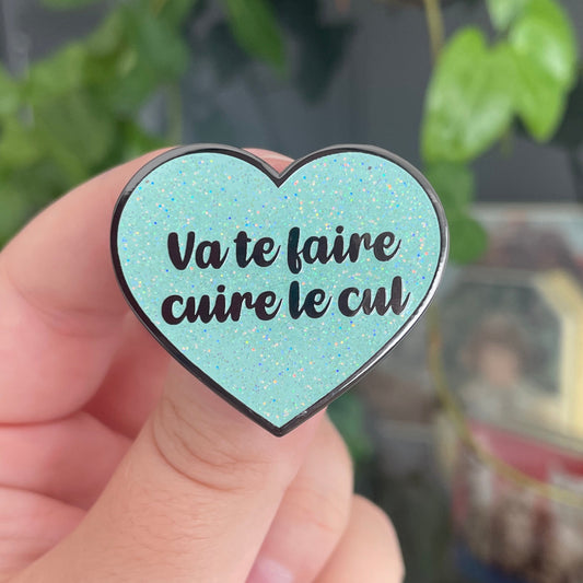 Pin en émail "Va te faire cuire le cul" turquoise à paillettes