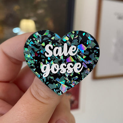 [CONTRÔLE TECHNIQUE] Broche "Sale gosse" en acrylique noire avec des confettis turquoise