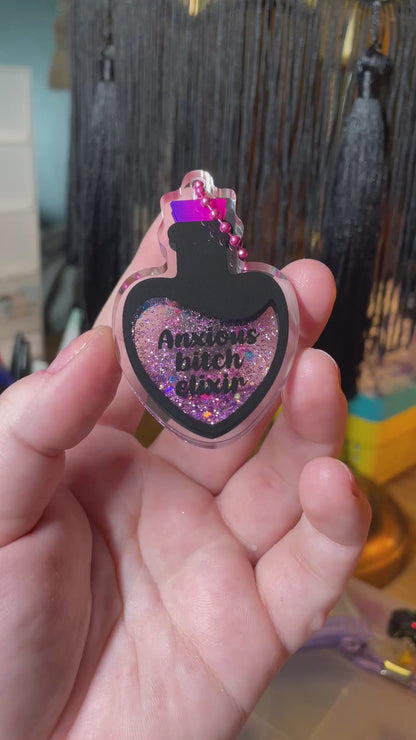 Porte-clés shaker rose "Anxious bitch elixir"