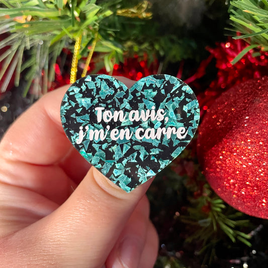 Broche "Ton avis j'm'en carre" en acrylique noire à confettis galactiques turquoise