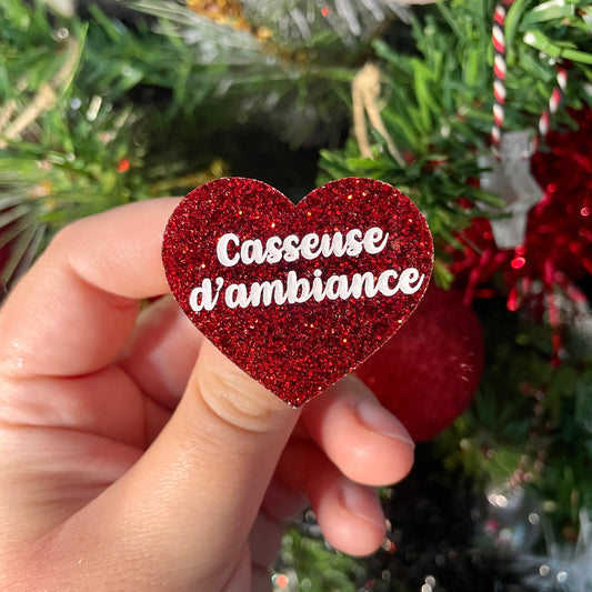 Broche "Casseuse d'ambiance" en acrylique à paillettes rouges