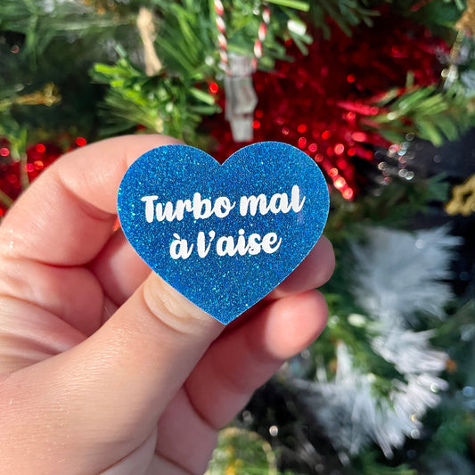 Broche "Turbo mal à l'aise" en acrylique à paillettes bleues