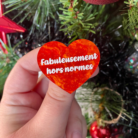 Broche "Fabuleusement hors normes" en acrylique marbrée orange à paillettes