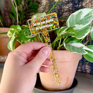Pic à plante "Je m'en bats le terreau" en acrylique transparente avec des étoiles dorées