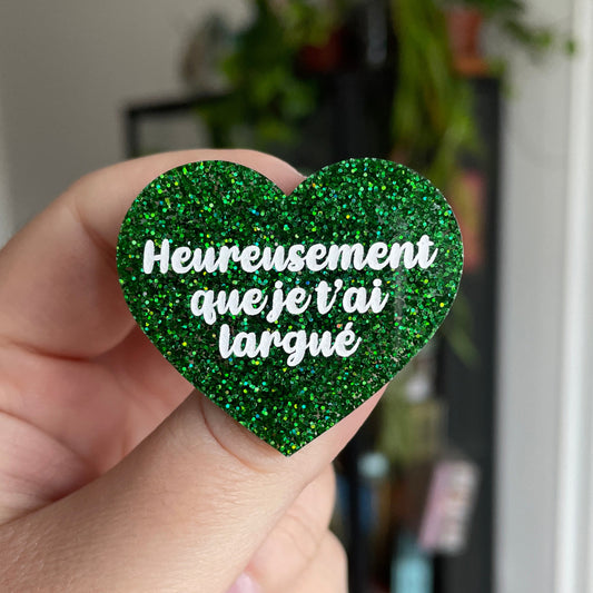 Broche "Heureusement que je t'ai largué" en acrylique verte à paillettes