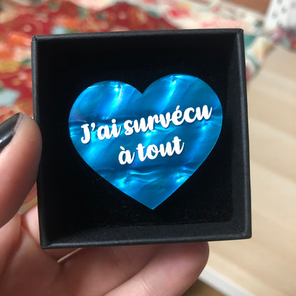 Broche "J'ai survécu à tout" en acrylique de sirène bleue