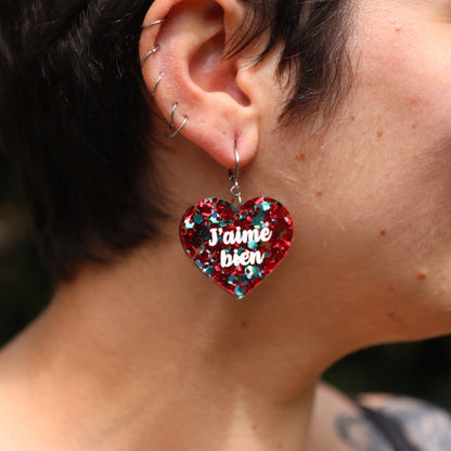 Boucles d'oreilles "J'aime bien" / "Quand tu parles pas" en acrylique à gros confettis rouges et turquoise