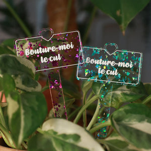 Pic à plante "Bouture-moi le cul" en acrylique transparente avec des éclats de confettis turquoise