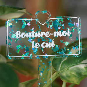Pic à plante "Bouture-moi le cul" en acrylique transparente avec des éclats de confettis turquoise